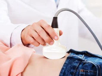 Ultrasound image of a lady's abdomen for diagnostic evaluation.