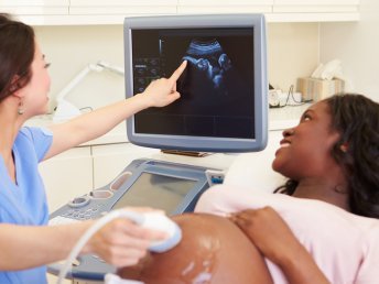 Doppler ultrasound image of a pregnant woman in the first trimester.