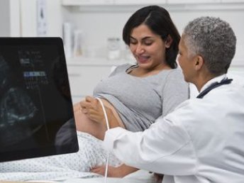 Detailed Doppler ultrasound image of a pregnant woman in the third trimester.